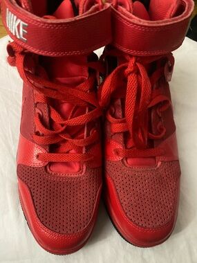 NEW WITHOUT TAG OR BOX
NIKE REVOLUTION high tops hidden wedge sneakers 9.5